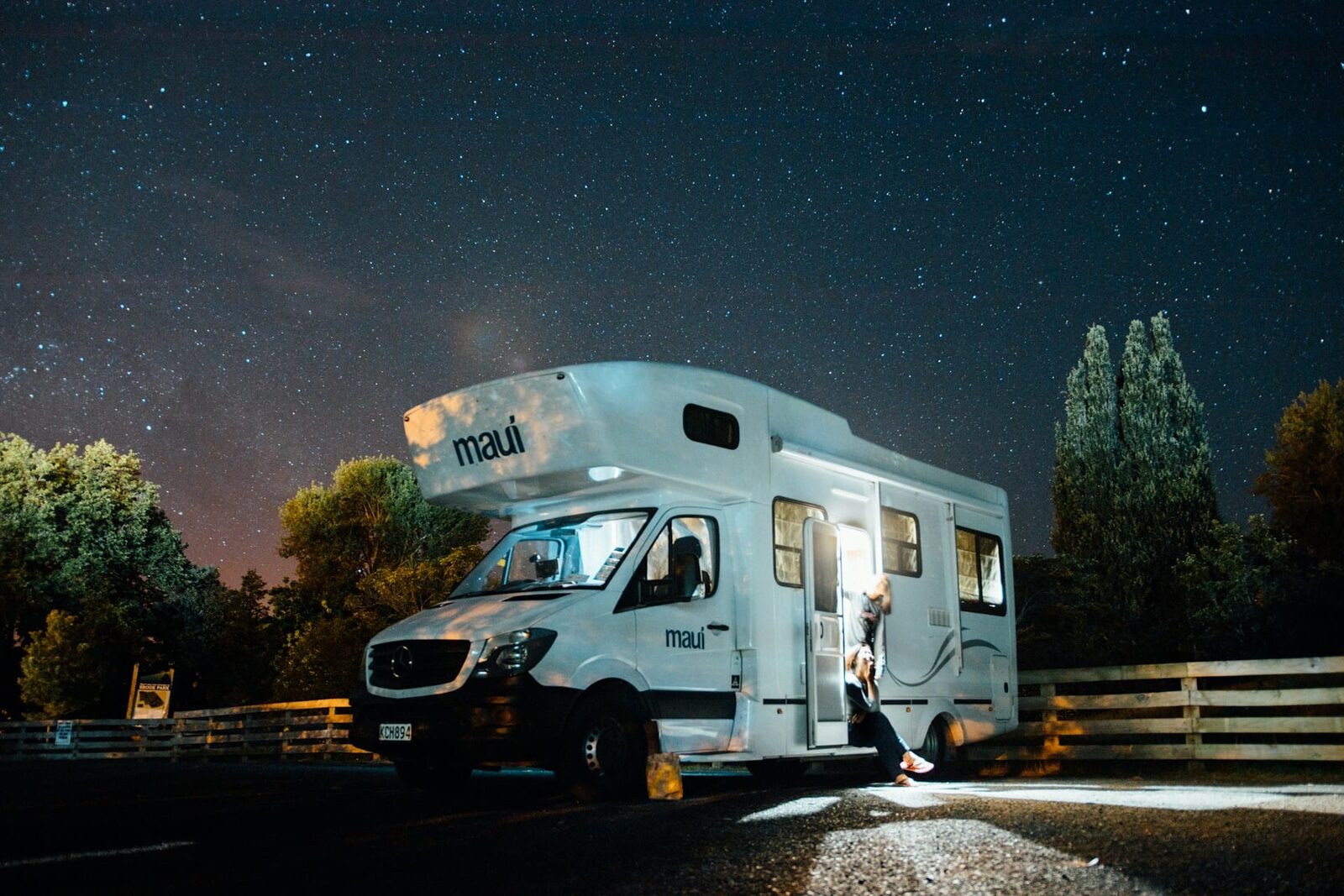 Motorhome parked under a starry Texas night sky