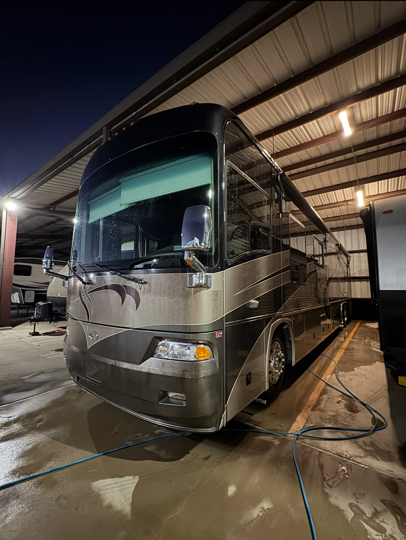 Diesel pusher motorhome picked up at night
